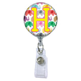 Happy Elephants Initial or Title Button Attached to a Badge Reel