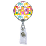 Happy Elephants Initial or Title Button Attached to a Badge Reel