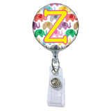 Happy Elephants Initial or Title Button Attached to a Badge Reel